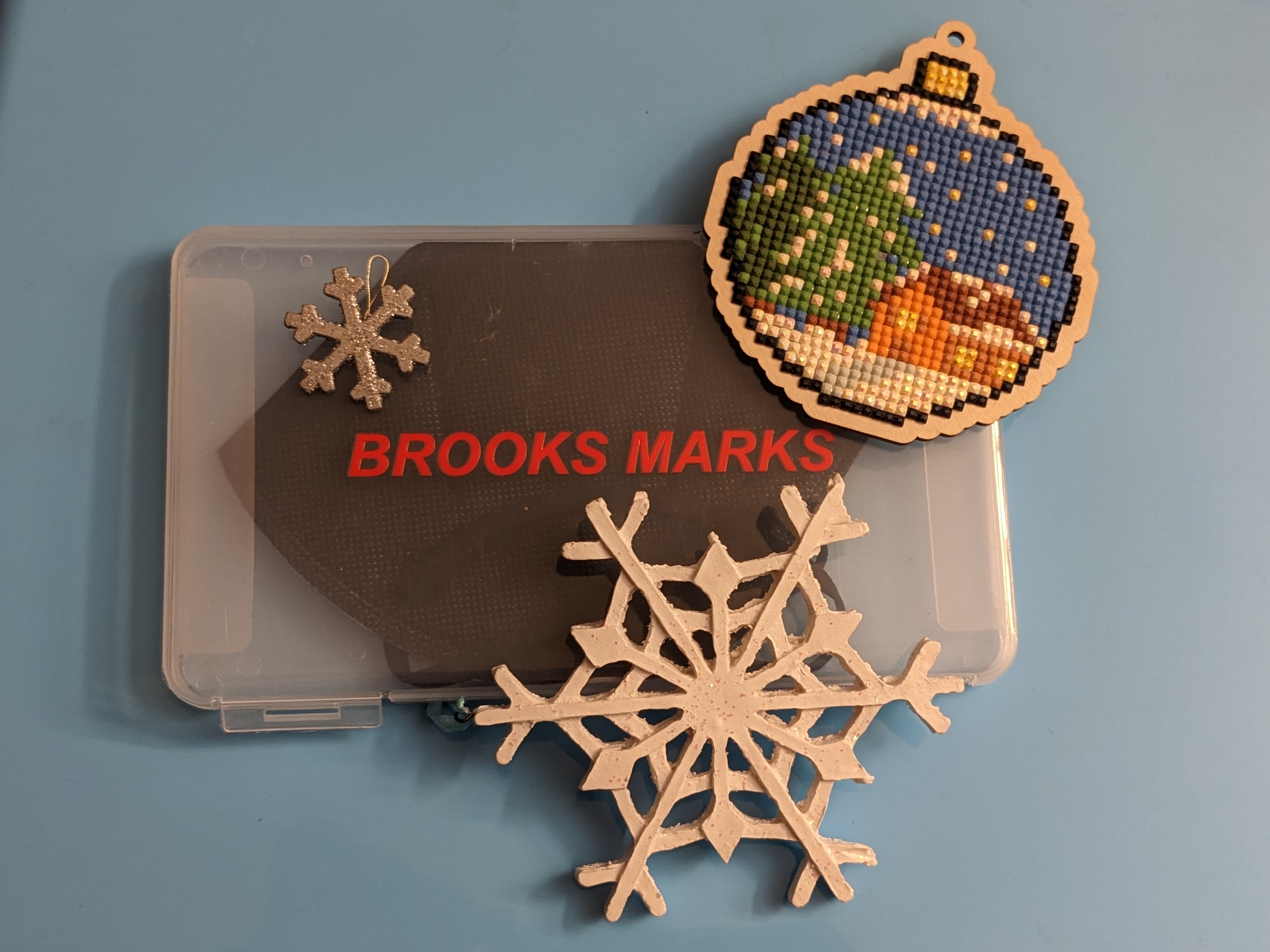 Brooks Marks case with holiday ornaments