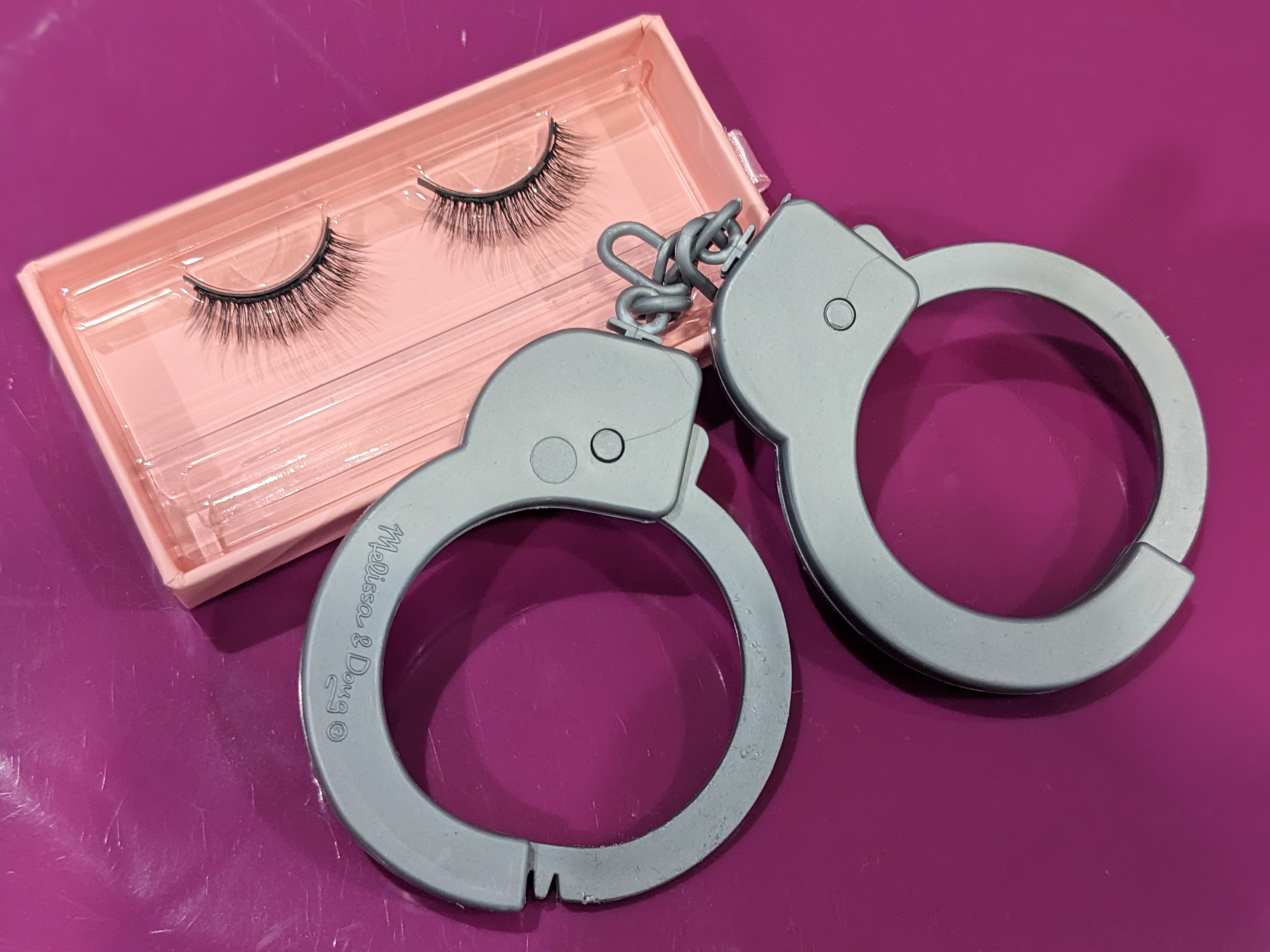 Hand cuffs and eyelashes