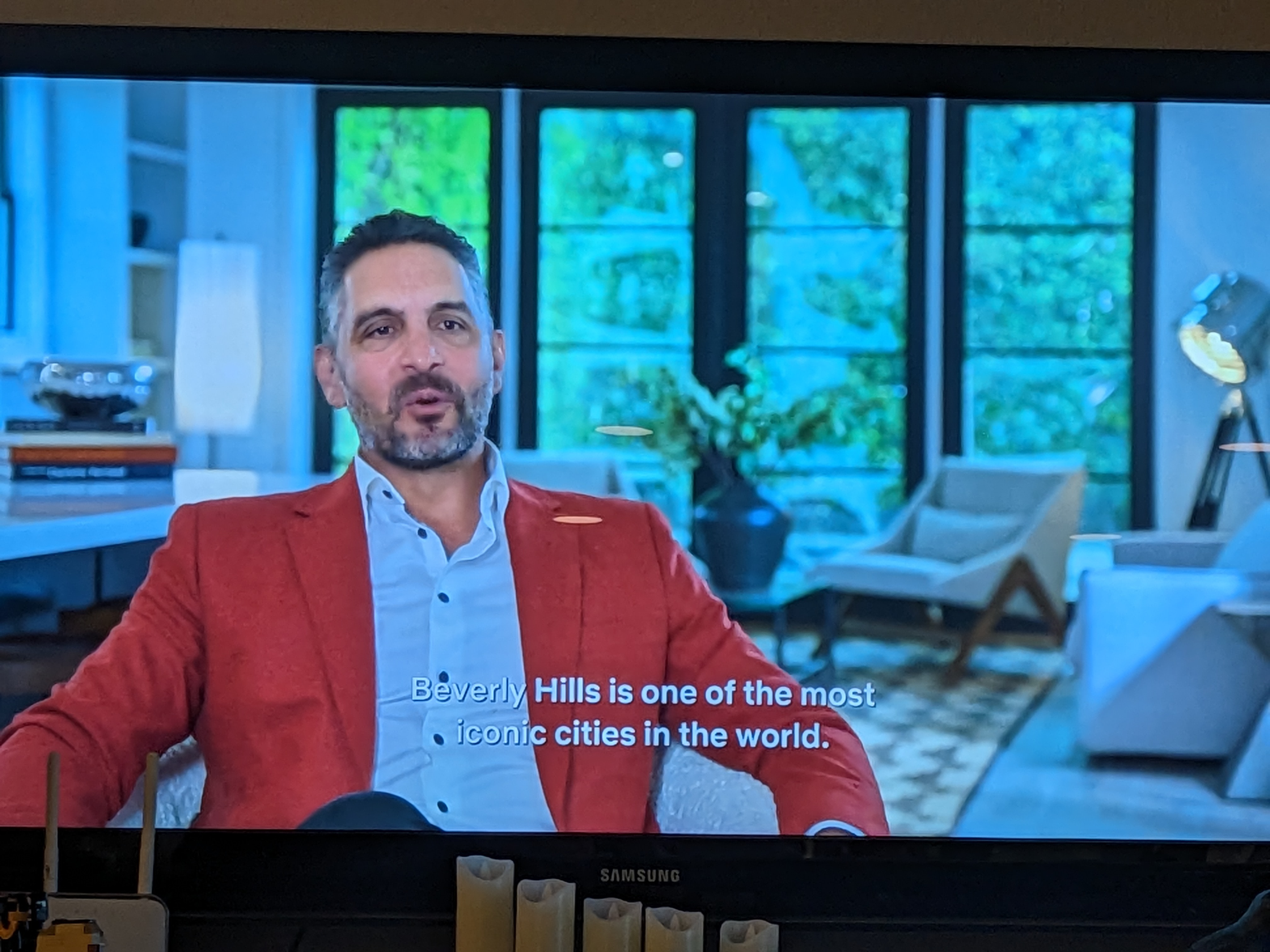 Scene from the show with Mauricio sitting and talking