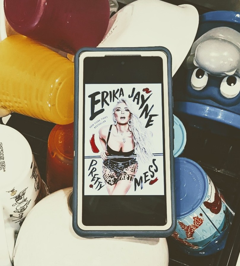 Pretty Mess digital book on top of dishes