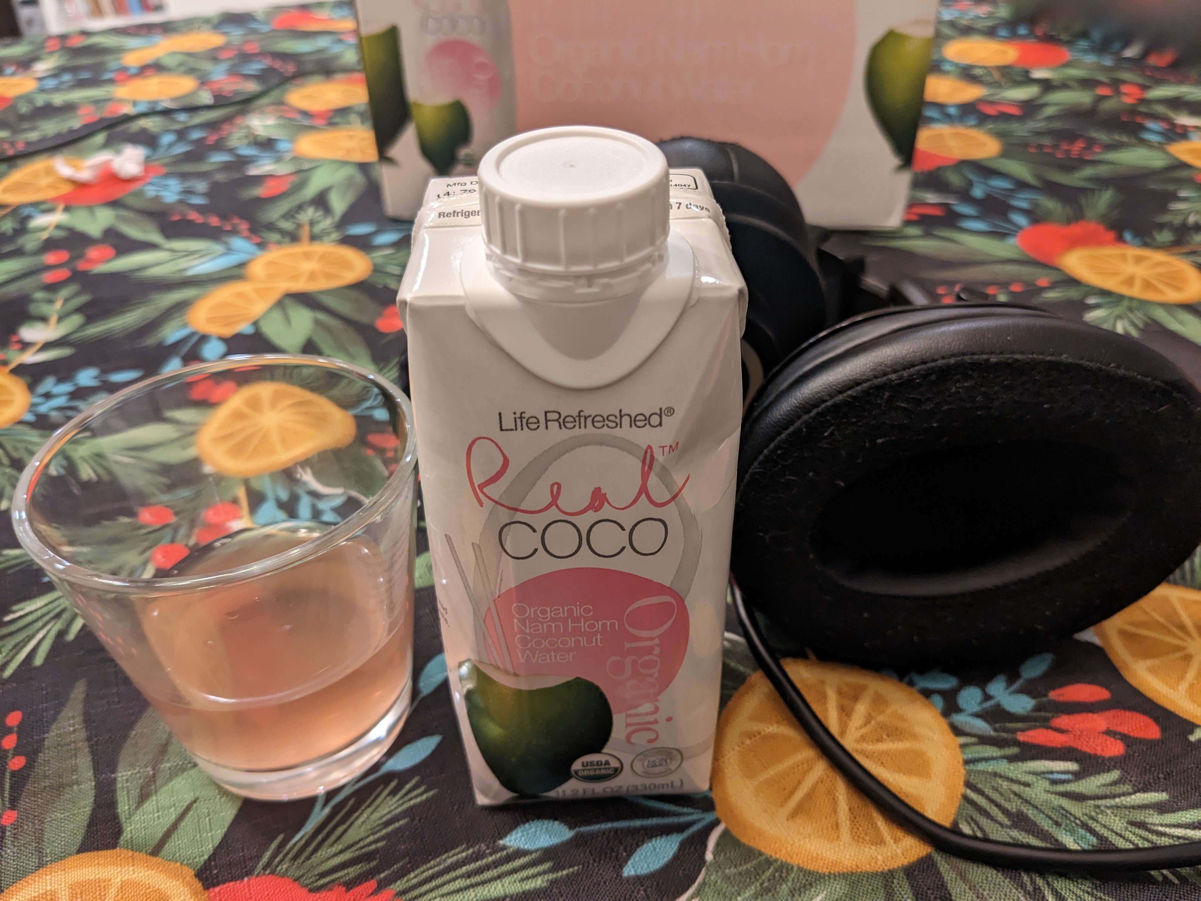 Real Coco Coconut water with headphones
